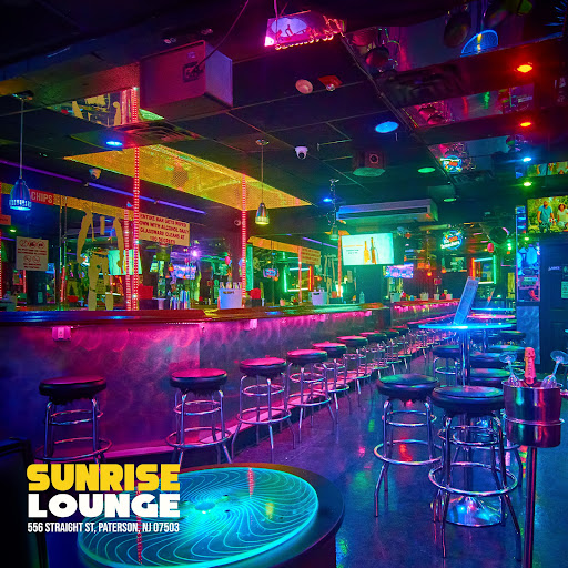 Sunrise Sports Gentlemen's Club the place for Cocktails beers and Sports first time customers 50% off bar tab